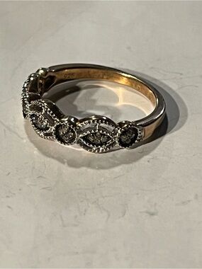Sterling silver and Rose colored ring. Colorless stones. Sz 6.